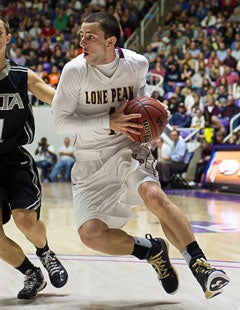 Playing with a broken thumb on his shooting hand, Nick Emery scored 13 points in his final game at Lone Peak.