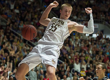 Eric Mika tallied 16 points and 18 rebounds to help Lone Peak capture its third state title in a row and put an exclamation point on a national championship season.