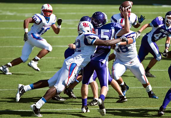 It's no laughing matter for quarterbacks when University of Virginia recruit Michael Moore reaches the backfield.