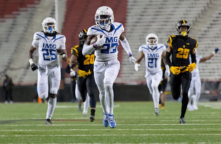 One of Friday night's most pivotal plays, Jordan Johnson-Rubell if IMG Academy pulls away for a pick-six in the final minute of the second quarter. (Photo: Cory Royster)