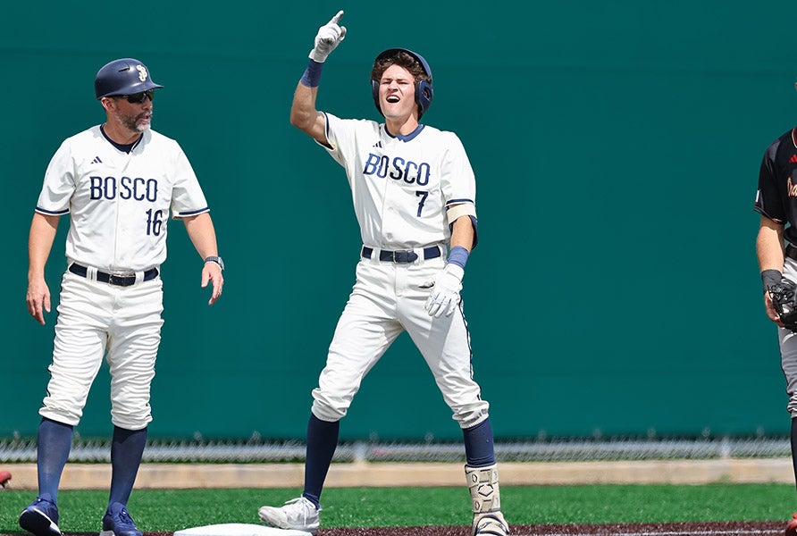 St. John Bosco senior Jack Champlin celebrates a big hit last week against Orange Lutheran. Champlin and the Braves took two of three from their Trinity League rival to rise to No. 3 in this week's rankings. (PHOTO: Tim Peck)