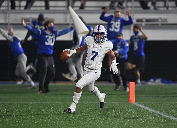 St. Xavier wide receiver Jalen Patterson celebrates the third of his four first-quarter TD catches as the Bombers beat Pickerington Central 44-3 in the Ohio Division I title game on Friday night.