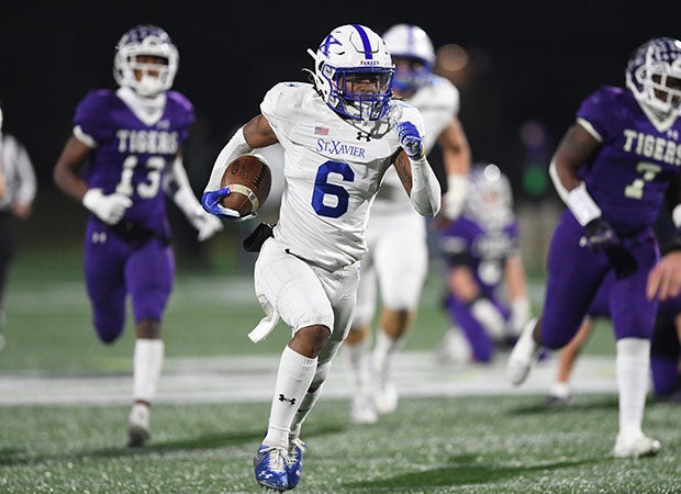 Gabriel Dubois returns a punt 60 yards for a St. Xavier touchdown.