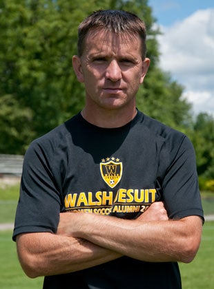 Head coach Dino McIntyre