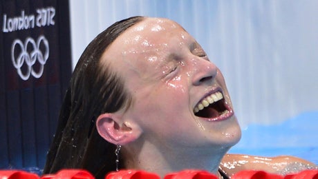Katie Ledecky, the youngest member of the U.S. Olympic sport, celebrates her 800-meter win in an American record time.