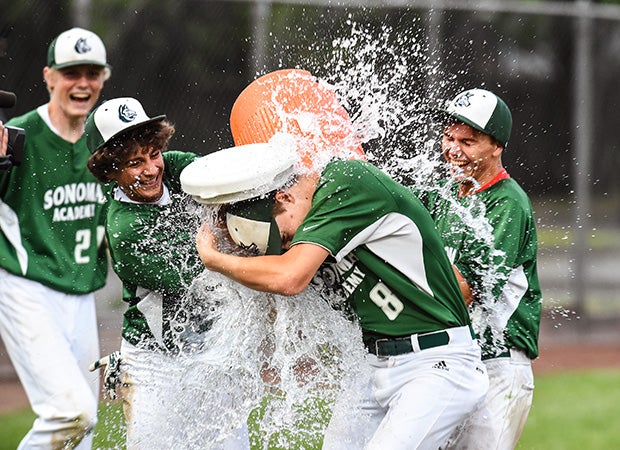 Pitcher Oscar McCauley is doused with water after recording the final out in Tuesday's victory over Tomales.