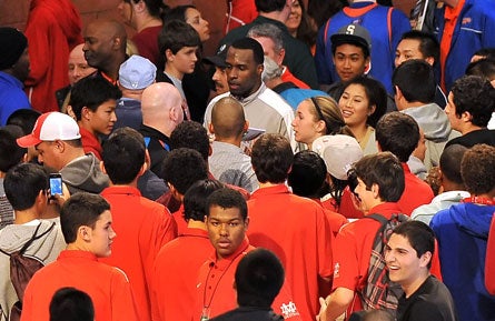 Shabazz Muhammad (center in gray and white) of No. 10 Bishop Gorman was the center of attention at the Nike Extravaganza over the weekend in Santa Ana, Calif.