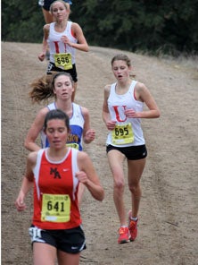 Holland was third at the 2.25-mile
mark of the state race. 