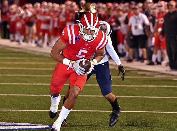 Bru McCoy hauls in one of his three touchdowns. He had four catches for 71 yards.