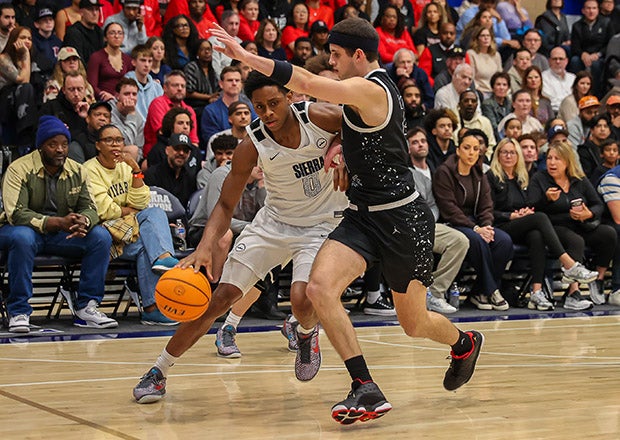 Sierra Canyon's Brandon McCoy (0) drives on Harvard-Westlake's Joe Sterling on his way to a game-high 20 points to help the No. 3 Trailblazers to a 55-47 victory on Wednesday night. (PHOTO CREDIT: Jace Kessler)