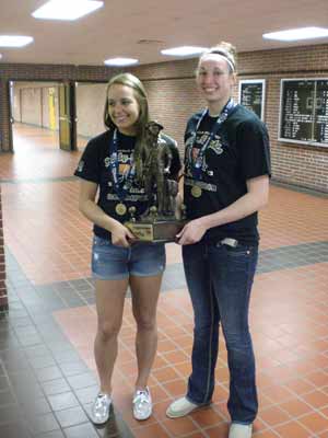 Jessica Shepard, right, is at Fremont this year. Lastyear (pictured) she was with Lincoln Southeast, whichdid not qualify this year.