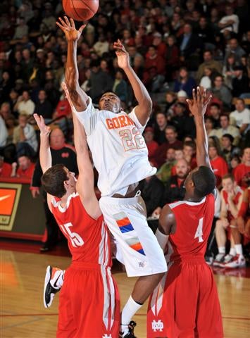 Gorman's Anson Winder battles a strong Mater Dei defense.