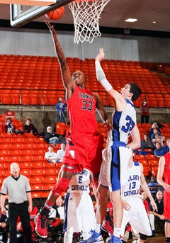 Turner attacks the bucket during a December game against Nolan Catholic of Fort Worth.