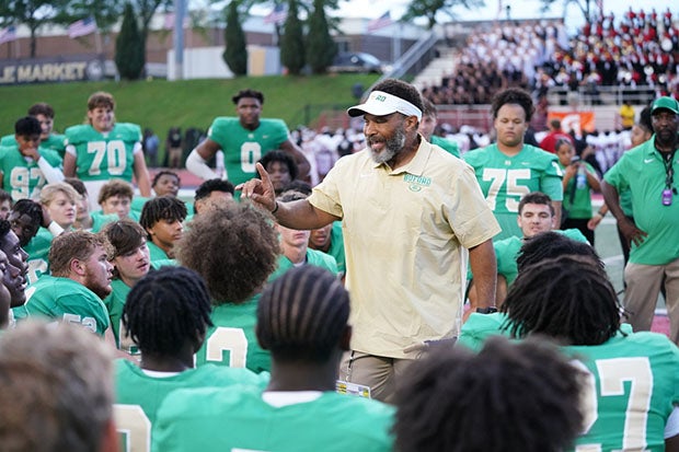 Buford head coach Bryant Appling talks with his team after an impressive season-opening win over Thompson.