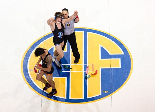 Trent Tracy of Frontier (Calif.) celebrates winning the 170-pound weight class during the finals of the CIF State Boys Wrestling Championships at Rabobank Arena in Bakersfield.
