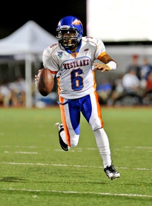 Junior quarterback Justin Moore rushed
for 222 yards and a TD for Westlake.