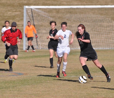 Colorado Academy's Marin McCoy, right, earned her spot as one of the state's top players, scoring 18 goals and 11 assists last season as a freshman.
