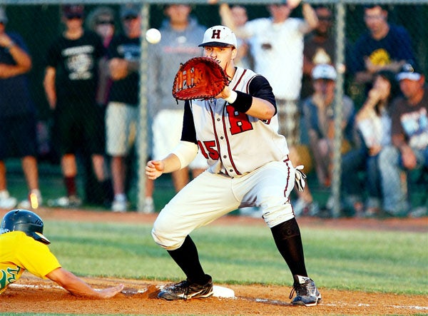 Rockwall-Heath's Jake Thompson prepares to try to make the tag during the Texas Class 4A regional quarterfinals on May 20.