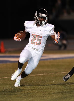 Tyjon Lindsey takes a punt back for the firsttouchdown of the game Friday.
