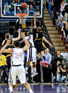 The ball is clearly out of Andrew's
hands and Quincy Smith (24) knows 
it's good. 