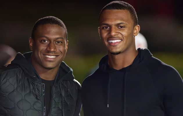 Blake Sims and DeShaun Watson pose for a photo on Friday night.