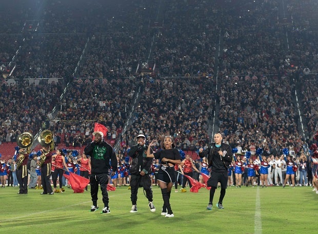 The Black Eyed Peas wowed a crown of 30,000 at the 8th annual East L.A. Classic between Roosevelt and Garfield. The B.E.P once performed at the Super Bowl and wanted to give back to the area that helped shape them. (Photo: Juan Ruvalcaba)