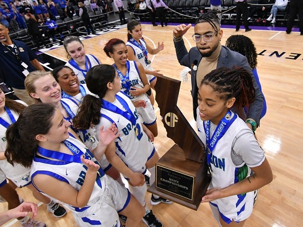 Branson players celebrate their CIF Division IV title after beating Imperial 46-23 on Saturday at Golden 1 Center in Sacramento.