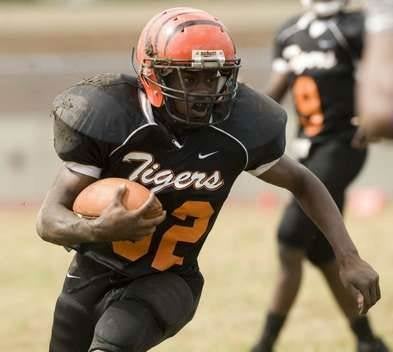 NJ coach, most players kneel for anthem