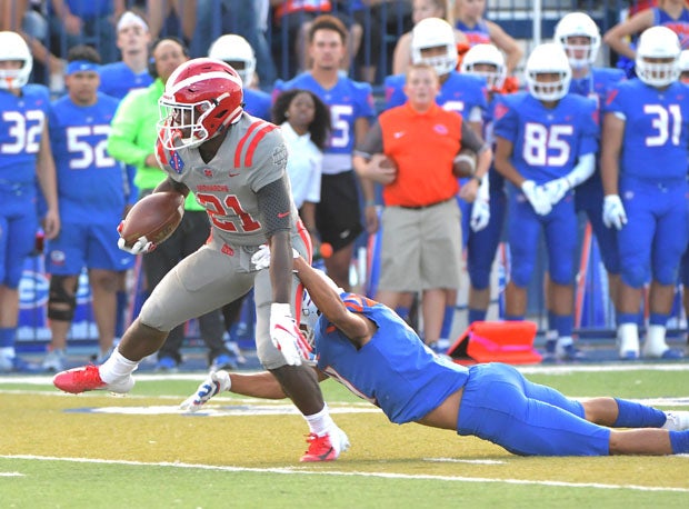 Sean Dollars breaks free on his 49-yard touchdown catch and run.
