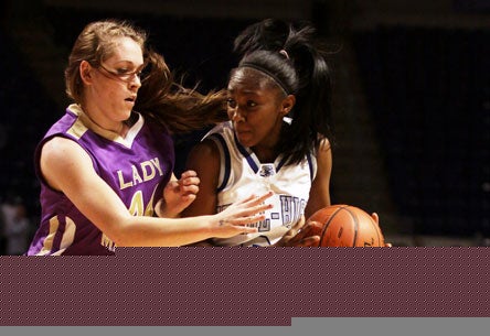 Malia Tate-DeFreitas had an anticlimactic entrance into the 1,000-point club. She made the jump into the 2,000-point club with much more excitement.