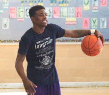 Aquille Carr is the "Crime Stopper" inBaltimore, because people leave thestreets to come watch him play.