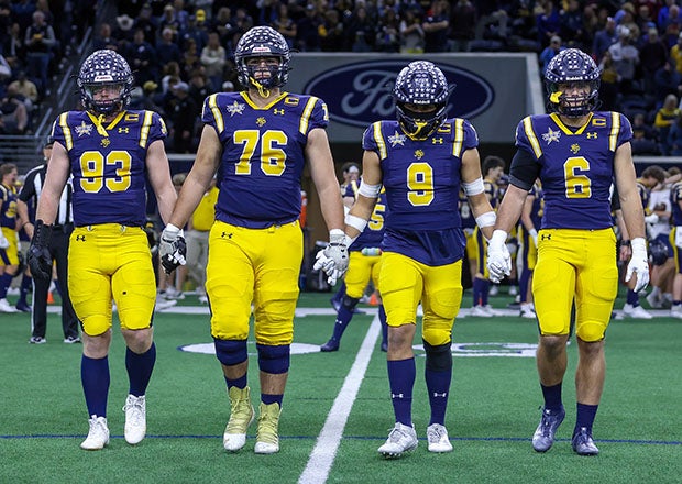 Highland Park captains take the field for a Texas playoff game against Reedy two weeks ago, a contest that would turn out to be win No. 898 for the Scots. The program could become the eighth to win 900 games tonight. (Photo: Michael Horbovetz)