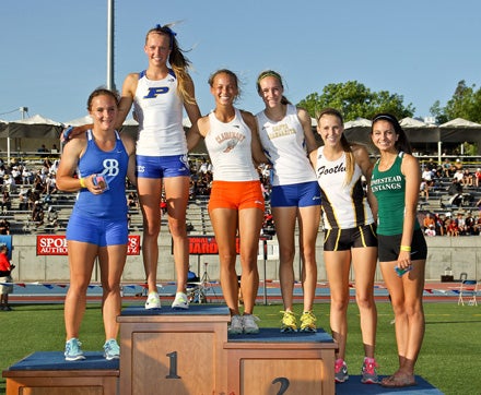 Presentation sophomore Taylore Jaques (top of stand) passed up four other competitors by clearing 13-4 1/4 to win the California state title on Saturday.