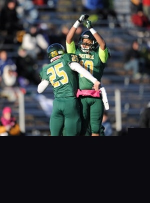 Levi Hansen, left, and C.J. Toomer jumped for joy afternearly winning a state title last season. They're back,and Service is the top team in the Alaska Fab 5.
