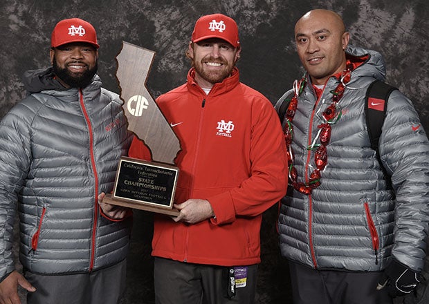 New Mater Dei head coach Frank McManus (center) celebrates a victory in the 2017 CIF Open Division state championship game. (Photo: Heston Quan)