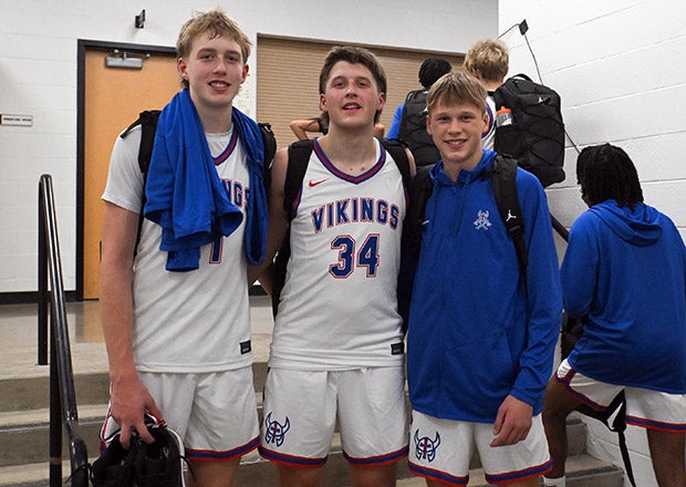 The three Knueppel brothers took a moment for a snap after their first win together at Wisconsin Lutheran on Wednesday night in Illinois. (PHOTO: Mindy McGlothlin)