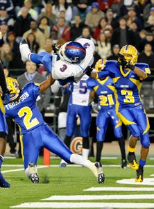 Folsom's Tyler Trosin gets flipped
during TD catch right before half.