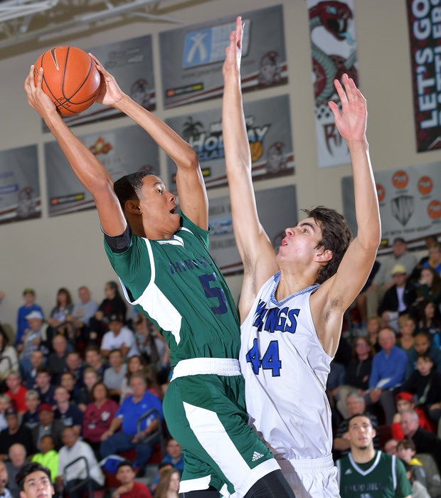 Andre Ball drives to the basket during Thursday night's semifinal victory over Pleasant Grove.