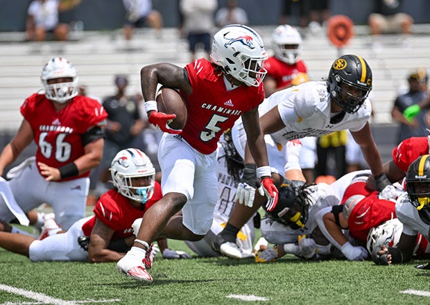 Junior running back Jaquari Lewis helped out the potent Chaminade-Madonna rushing attack. (Photo: Patrick Tewey)