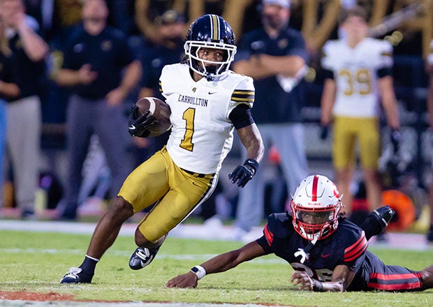 Peyton Zachary's late pick-six put things away for Carrollton. (PHOTO: Corey Jones)