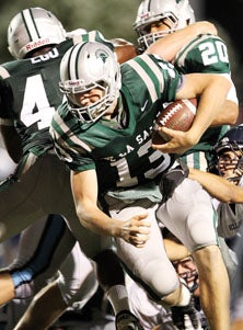 Though Bart Houston is a bomber first
he's shown the toughness to run for
TDs as shown in this game-winner in
the season-opener against Bellarmine.
