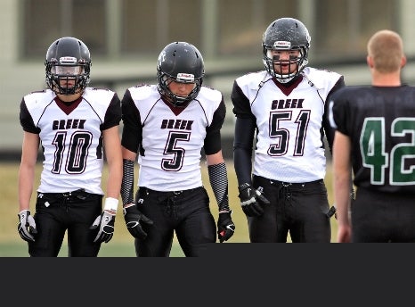 Silver Creek defensive standouts Michael Simboski (10), Andre Apodaca (5) and Levi Cecil (51) will be focused on stopping Rifle running back Ryan Moeller in the Class 3A state title game.