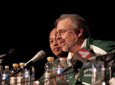 Terry Eidson (right) has been a De La Salle assistant, athletic director and defensive coordinator for 31 seasons. Leo Lopoz (behind) is currently De La Salle's assistant.