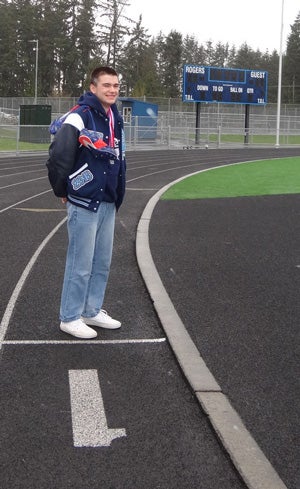Smith dedicates himself in cross country,
track and field, and in the classroom for Rogers.