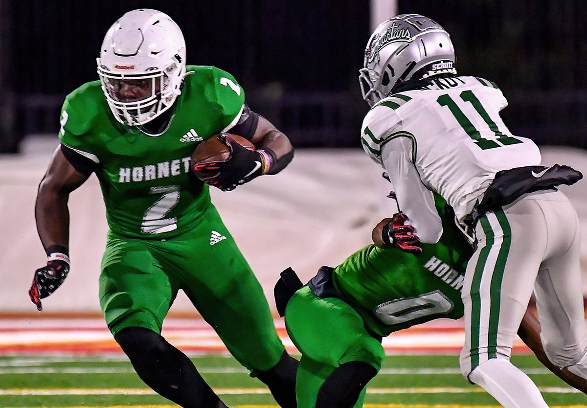 Roderick Robinson scored four touchdowns as Lincoln beat De La Salle 33-28 in the CIF Division 1-AA finals Friday at Saddleback College in Mission Viejo. (Photo: Louis Lopez)