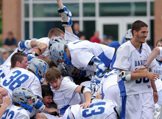 Darien celebrates a 17-11 Class M championship game victory over Wilton.
