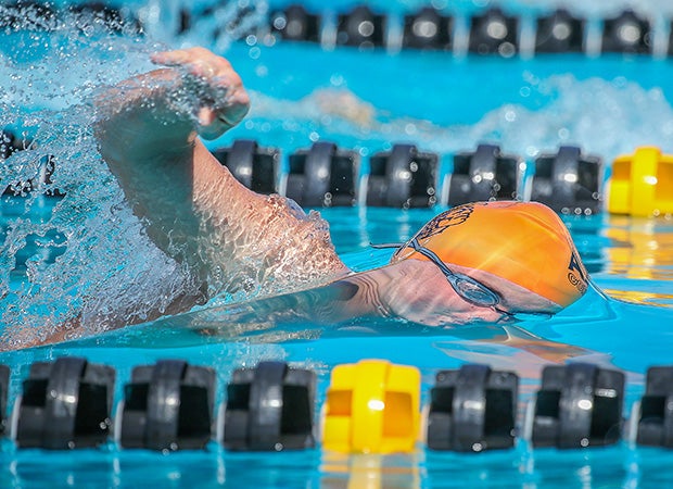 Corona del Sol (Ariz.) swimmer Dylan Edge competes in the varsity boys 400 freestyle relay event during the Wolves Classic Invitational.