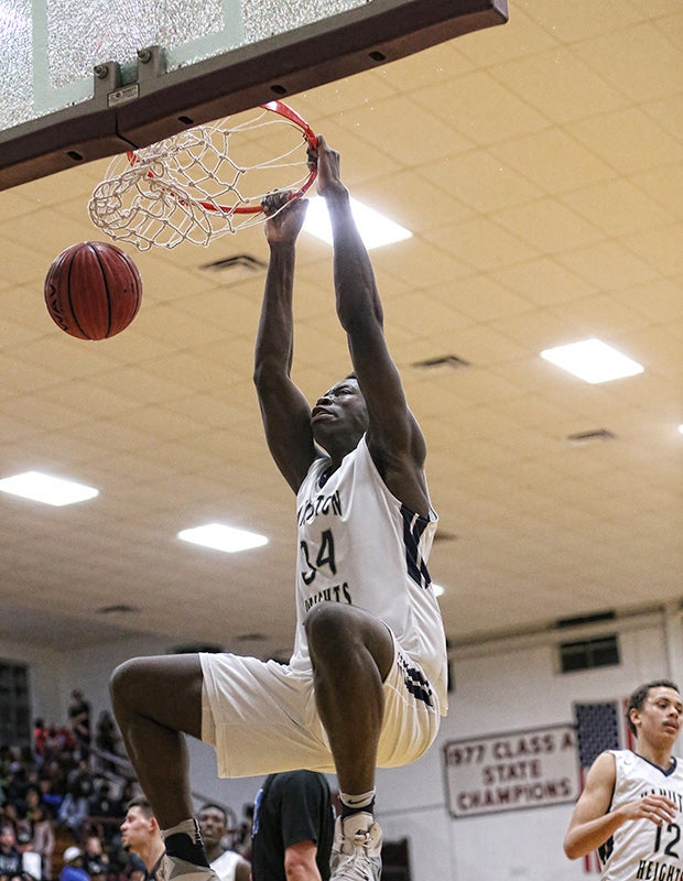 Hamilton Heights Christian Academy (Tenn.) center Kaosi Ezeagu shatters the backboard on a monster dunk against Southwest Christian Academy during the Hotbed Classic at Memorial Gym in New Albany (Miss.).