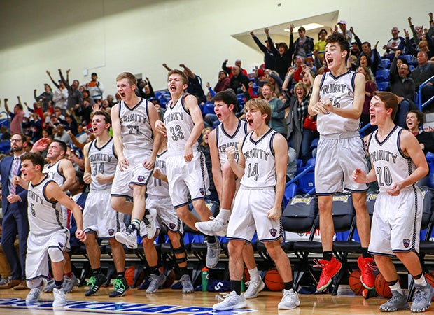 Trinity Christian (Texas) players and fans celebrate a go-ahead basket in the large school final of the Fibermax Caprock Classic.