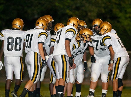 Shelby's golden helmets make the school stand out. So does the program's all-time record.